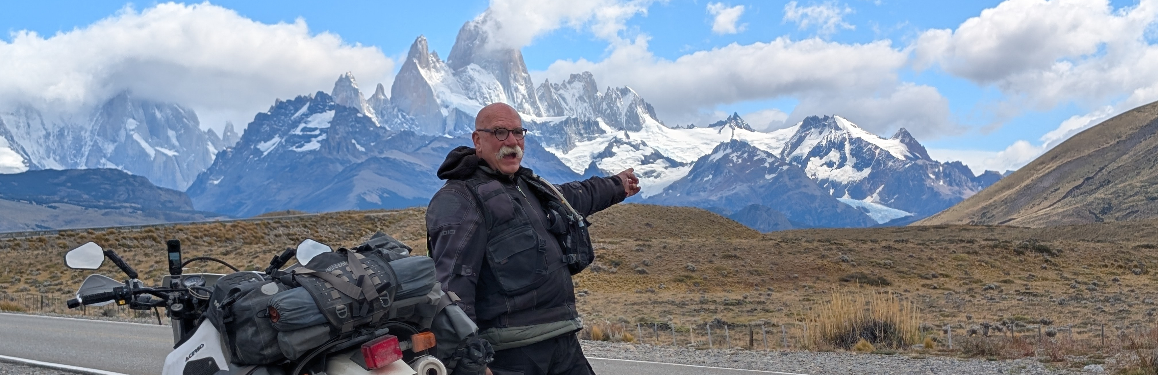 Mark Silver standing in front of Torres de Paine, Chile